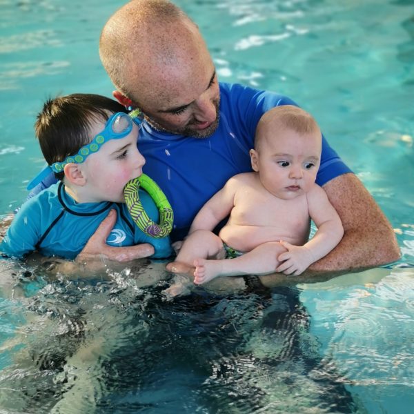 Our Story - David Bree with his boys in the pool.